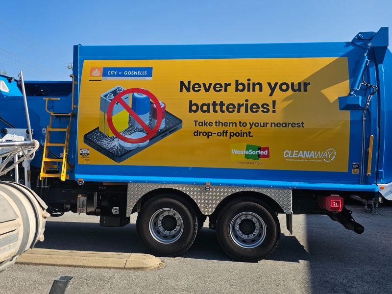 Blue truck with "Never bin your batteries!" message